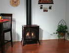SPIRIT DV MEDIUM CAST IRON STOVE -IPI, LP PORCELAIN MAHOGANY W/ CONTOUR BURNER & LOG SET